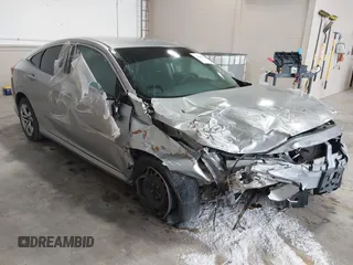 2017 Honda Civic LX z VIN 19XFC2F53HE218579, wystawiony jako IAAI lot #40935184 z przebiegiem 78 417 mil mil oraz . Historia ofert i sprzedaży dostępna na DreamBid. Obrazek 1.