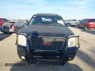 2014 GMC Yukon SLT with VIN 1GKS1CE00ER247249, listed as a IAAI auction lot 41271351 with 215,044 mi miles. Bid and sale history available at carsss.com. Image 12.