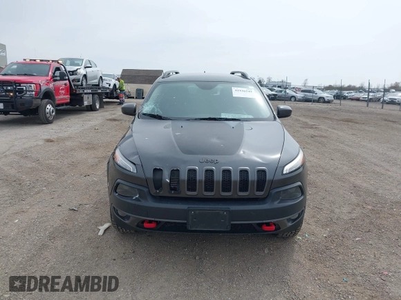 2016 Jeep Cherokee Trailhawk z VIN 1C4PJMBS4GW167650, wystawiony jako IAAI lot #41936549 z przebiegiem 218 000 mil mil oraz . Historia ofert i sprzedaży dostępna na DreamBid. Obrazek 12.