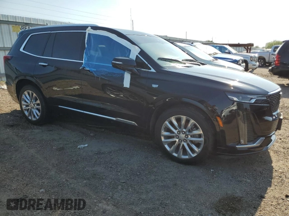 2020 Cadillac XT6 FWD Premium Luxury с VIN 1GYKPCRSXLZ174002, выставлен на аукционе Copart как лот 52083235 с пробегом 79 712 миль миль и Списание • Salvage title. История ставок и продаж доступна на DreamBid. Изображение 4.