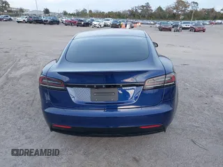2023 Tesla Model S with VIN 5YJSA1E53PF518986, listed as a IAAI auction lot 41223046 with 22,204 mi miles and . Bid and sale history available at DreamBid. Image 17.