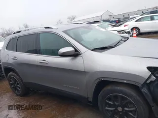 2016 Jeep Cherokee Latitude with VIN 1C4PJLCS8GW363504, listed as a IAAI auction lot 41543553 with 143,278 mi miles. Bid and sale history available at carsss.com. Image 14.