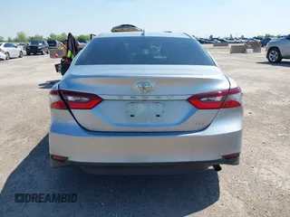 2024 Toyota Camry LE z VIN 4T1R11AKXRU883388, wystawiony jako IAAI lot #41977607 z przebiegiem 8 784 mil mil oraz . Historia ofert i sprzedaży dostępna na DreamBid. Obrazek 16.