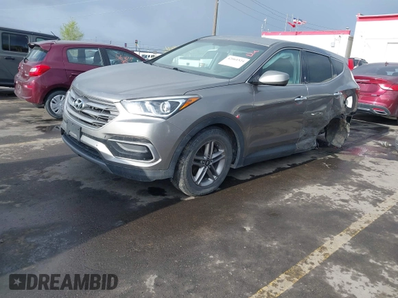 2017 Hyundai Santa Fe 2.4L with VIN 5XYZTDLB9HG440064, listed as a IAAI auction lot 42061524 with 140,365 mi miles and . Bid and sale history available at DreamBid. Image 18.