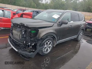 2020 Kia Telluride EX with VIN 5XYP3DHC3LG020303, listed as a IAAI auction lot 42249452 with 93,402 mi miles and . Bid and sale history available at DreamBid. Image 2.