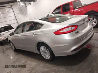 2014 Ford Fusion SE Hybrid с VIN 3FA6P0LU1ER227571, выставлен на аукционе IAAI как лот 42391487 с пробегом 127 979 миль миль и . История ставок и продаж доступна на DreamBid. Изображение 14.