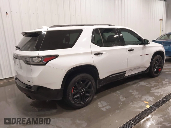 2018 Chevrolet Traverse Premier z VIN 1GNEVJKW4JJ163087, wystawiony jako IAAI lot #41509692 z przebiegiem 118 158 mil mil oraz . Historia ofert i sprzedaży dostępna na DreamBid. Obrazek 4.