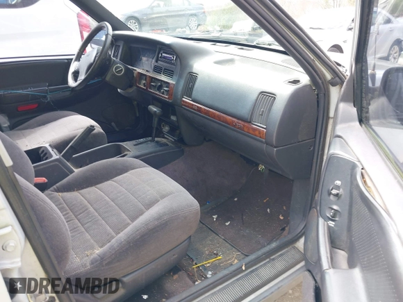 1996 Jeep Grand Cherokee Laredo with VIN 1J4EX58S1TC122268, listed as a IAAI auction lot 42005236 with 288,466 mi miles. Bid and sale history available at carsss.com. Image 5.