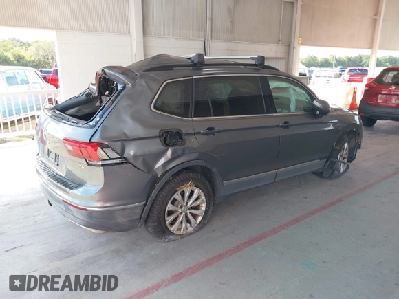 2018 Volkswagen Tiguan SEL with VIN 3VV3B7AXXJM213579, listed as a IAAI auction lot 42664339 with 84,676 mi miles and . Bid and sale history available at DreamBid. Image 4.