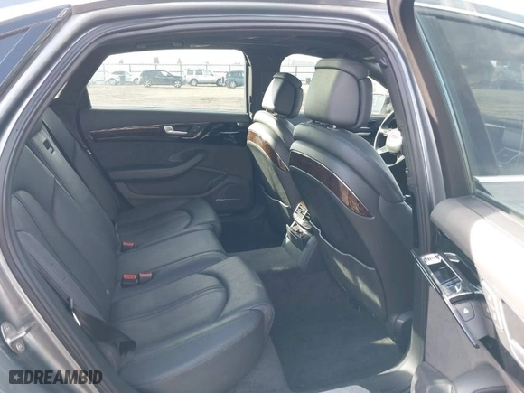 2016 Audi A8 L 3.0T with VIN WAU34AFD0GN005520, listed as a IAAI auction lot 41689248 with 76,150 mi miles. Bid and sale history available at carsss.com. Image 8.