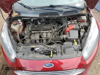 2016 Ford Fiesta SE z VIN 3FADP4EJ1GM130629, wystawiony jako Copart lot #51976355 z przebiegiem 119 337 mil mil oraz Szkoda całkowita • Salvage title. Historia ofert i sprzedaży dostępna na DreamBid. Obrazek 11.
