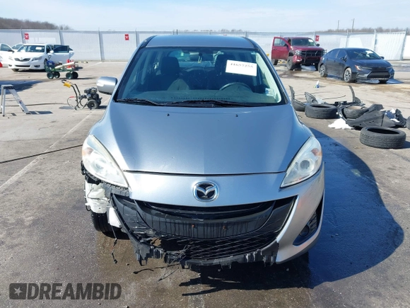 2013 Mazda 5 Sport with VIN JM1CW2BL6D0146696, listed as a IAAI auction lot 41657255 with 142,939 mi miles and . Bid and sale history available at DreamBid. Image 13.