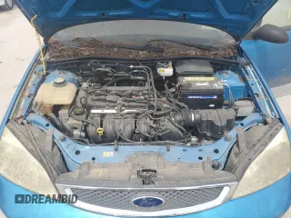 2007 Ford Focus S z VIN 1FAFP31N77W138844, wystawiony jako Copart lot #60702195 z przebiegiem Nie podano mil oraz Czysty tytuł • Clean title. Historia ofert i sprzedaży dostępna na DreamBid. Obrazek 11.