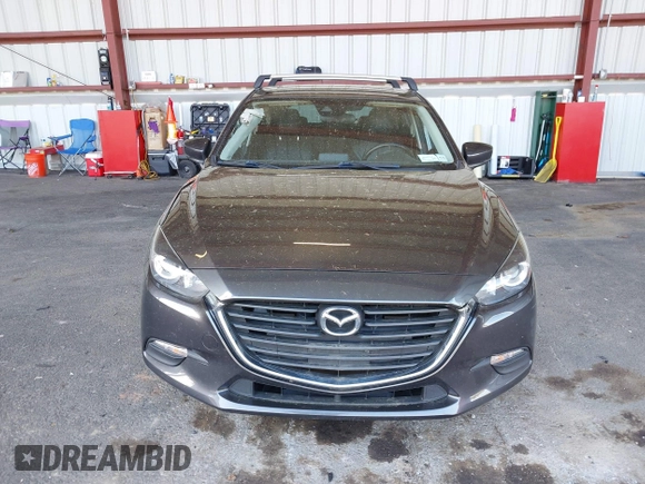 2018 Mazda 3 Touring with VIN 3MZBN1L35JM229453, listed as a IAAI auction lot 42123176 with 113,051 mi miles and . Bid and sale history available at DreamBid. Image 12.
