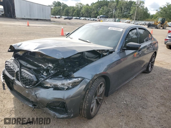 2022 BMW 3 Series M340i xDrive with VIN WBA5U9C02NFL65825, listed as a Copart auction lot 60244064 with 22,548 mi miles and Salvage Title. Bid and sale history available at DreamBid. Image 1.