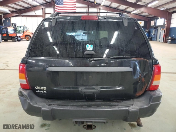 2003 Jeep Grand Cherokee Laredo with VIN 1J4GW48S23C613471, listed as a Copart auction lot 49521865 with 189,918 mi miles and Salvage Title. Bid and sale history available at carsss.com. Image 6.