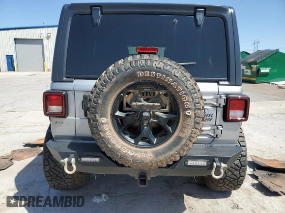 2021 Jeep Wrangler Unlimited Willys z VIN 1C4HJXDN6MW590786, wystawiony jako Copart lot #52903845 z przebiegiem Nie podano mil oraz Szkoda całkowita • Salvage title. Historia ofert i sprzedaży dostępna na DreamBid. Obrazek 6.