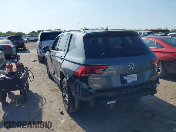 2020 Volkswagen Tiguan SE with VIN 3VV3B7AXXLM137641, listed as a IAAI auction lot 41830400 with 68,067 mi miles and . Bid and sale history available at DreamBid. Image 3.