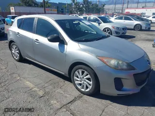 2012 Mazda Mazda3 i Touring with VIN JM1BL1L87C1609141, listed as a IAAI auction lot 41871418 with 125,253 mi miles. Bid and sale history available at carsss.com. Image 1.
