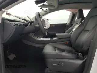 2023 Tesla Model Y Long Range z VIN 7SAYGDEE9PA070232, wystawiony jako Copart lot #55881805 z przebiegiem 38 276 mil mil oraz Szkoda całkowita • Salvage title. Historia ofert i sprzedaży dostępna na DreamBid. Obrazek 7.