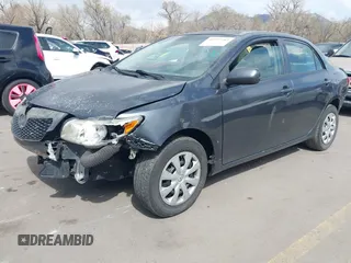 2010 Toyota Corolla with VIN 1NXBU4EE9AZ215505, listed as a IAAI auction lot 41957182 with 143,566 mi miles. Bid and sale history available at carsss.com. Image 2.
