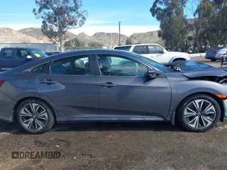 2017 Honda Civic EX-T with VIN 2HGFC1F33HH650782, listed as a IAAI auction lot 41685090 with 113,319 mi miles and . Bid and sale history available at carsss.com. Image 14.