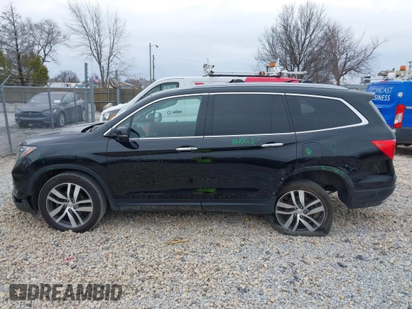 2017 Honda Pilot Touring with VIN 5FNYF6H90HB051700, listed as a IAAI auction lot 41902075 with 69,712 mi miles. Bid and sale history available at carsss.com. Image 15.