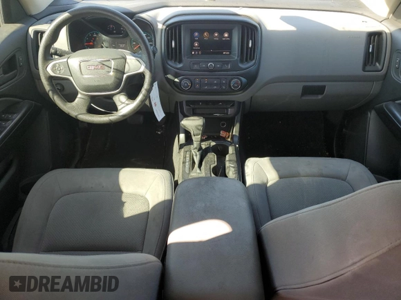 2020 GMC Canyon 2WD with VIN 1GTG5BEA2L1237021, listed as a Copart auction lot 76358214 with 77,815 mi miles and Salvage Title. Bid and sale history available at carsss.com. Image 8.