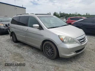 2006 Honda Odyssey Touring z VIN 5FNRL38886B000011, wystawiony jako Copart lot #57399225 z przebiegiem 256 217 mil mil oraz Szkoda całkowita • Salvage title. Historia ofert i sprzedaży dostępna na DreamBid. Obrazek 4.