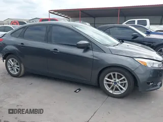 2018 Ford Focus SE with VIN 1FADP3F22JL295342, listed as a IAAI auction lot 42335881 with 77,464 mi miles and . Bid and sale history available at DreamBid. Image 14.
