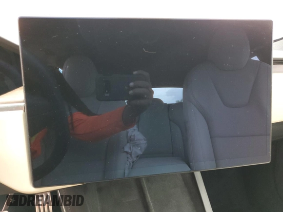 2023 Tesla Model S with VIN 5YJSA1E58PF498685, listed as a Copart auction lot 41690475 with Not provided miles and Salvage title. Bid and sale history available at DreamBid. Image 9.