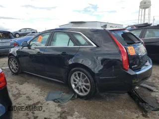 2014 Cadillac CTS with VIN 1G6DH8E3XE0134312, listed as a Copart auction lot 61556874 with 77,194 mi miles and Salvage Title. Bid and sale history available at DreamBid. Image 2.