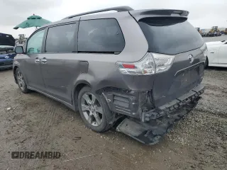 2014 Toyota Sienna SE with VIN 5TDXK3DC3ES470042, listed as a Copart auction lot 49254335 with 99,208 mi miles and Salvage Title. Bid and sale history available at DreamBid. Image 2.