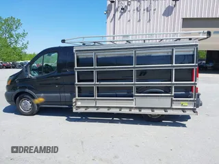 2015 Ford Transit Cargo z VIN 1FTBW2YG7FKA20201, wystawiony jako IAAI lot #42253463 z przebiegiem 83 235 mil mil oraz . Historia ofert i sprzedaży dostępna na DreamBid. Obrazek 14.