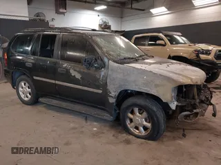 2007 GMC Envoy SLE with VIN 1GKDT13S872298442, listed as a IAAI auction lot 41343565 with 106,818 mi miles. Bid and sale history available at carsss.com. Image 1.
