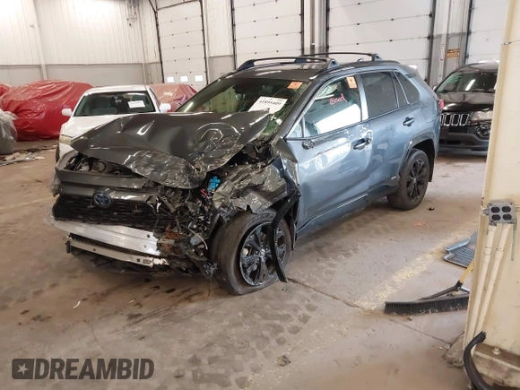 2023 Toyota RAV4 Hybrid SE with VIN JTM16RFV9PD089029, listed as a IAAI auction lot 41895409 with Not provided miles and . Bid and sale history available at DreamBid. Image 2.