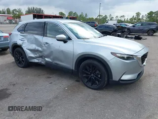 2023 Mazda CX-9 Touring Plus with VIN JM3TCBAY7P0652913, listed as a IAAI auction lot 42186917 with 20,649 mi miles and . Bid and sale history available at DreamBid. Image 1.