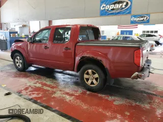 2011 Nissan Frontier Pro-4X with VIN 1N6AD0EV2BC400945, listed as a Copart auction lot 58693635 with 122,209 mi miles and Salvage title. Bid and sale history available at DreamBid. Image 2.