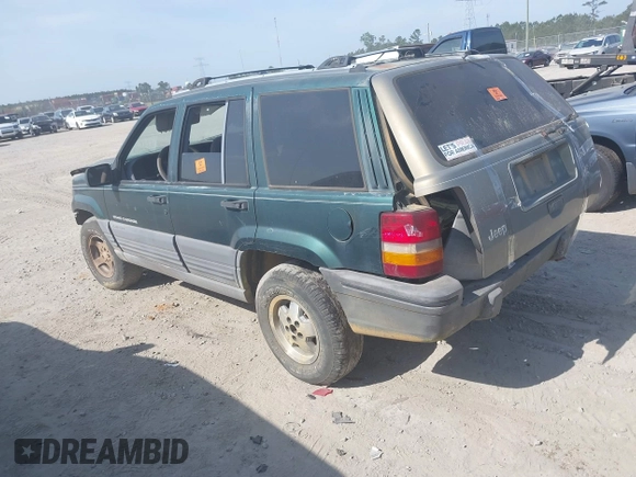 1996 Jeep Grand Cherokee Laredo with VIN 1J4FX58S9TC300710, listed as a IAAI auction lot 42073391 with 1 mi miles. Bid and sale history available at carsss.com. Image 3.