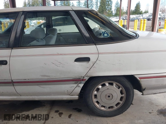 1992 Mercury Sable z VIN 1MECM5049NG647978, wystawiony jako IAAI lot #41805346 z przebiegiem 23 634 mil mil oraz . Historia ofert i sprzedaży dostępna na DreamBid. Obrazek 6.