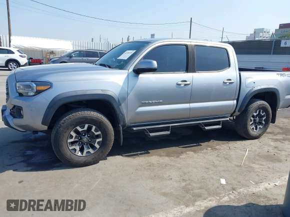 2020 Toyota Tacoma SR5 with VIN 3TMAZ5CN7LM138859, listed as a IAAI auction lot 42150725 with 36,462 mi miles and . Bid and sale history available at DreamBid. Image 14.