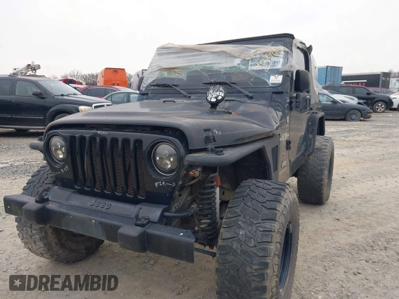 2003 Jeep Wrangler X with VIN 1J4FA39S33P375741, listed as a IAAI auction lot 40858427 with Not provided miles and . Bid and sale history available at DreamBid. Image 2.