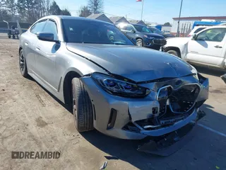 2024 BMW i4 eDrive35 with VIN WBY43AW06RFR93826, listed as a IAAI auction lot 41238948 with 9,480 mi miles. Bid and sale history available at carsss.com. Image 1.