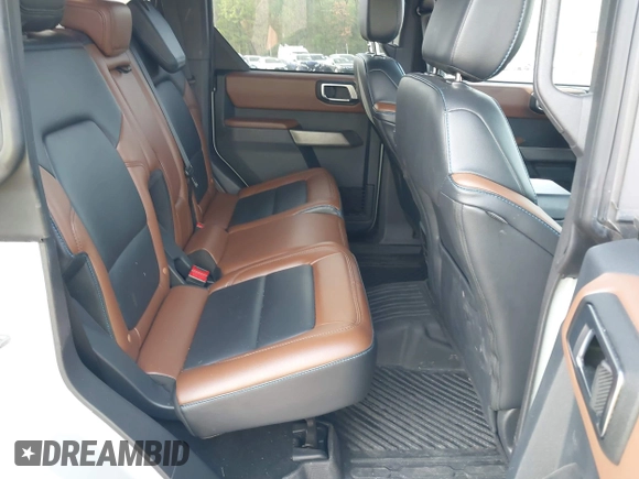 2023 Ford Bronco with VIN 1FMDE5BH3PLA90591, listed as a IAAI auction lot 42127867 with 34,616 mi miles and . Bid and sale history available at DreamBid. Image 8.