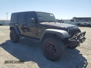 2012 Jeep Wrangler Unlimited Call of Duty MW3 with VIN 1C4BJWFGXCL148883, listed as a Copart auction lot 53162705 with 111,900 mi miles and Salvage title. Bid and sale history available at DreamBid. Image 4.
