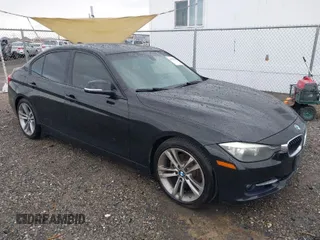 2013 BMW 3 Series 328i with VIN WBA3A5C56DF453232, listed as a IAAI auction lot 41794450 with 152,304 mi miles. Bid and sale history available at carsss.com. Image 1.