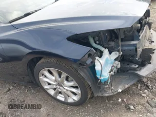 2015 Mazda 3 S Grand Touring with VIN JM1BM1W37F1255297, listed as a IAAI auction lot 41836467 with 145,361 mi miles and . Bid and sale history available at DreamBid. Image 17.