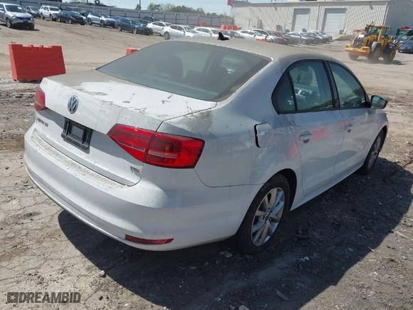 2015 Volkswagen Jetta Sedan 1.8T Sport with VIN 3VWD17AJ9FM321682, listed as a IAAI auction lot 41889188 with 135,238 mi miles. Bid and sale history available at carsss.com. Image 4.