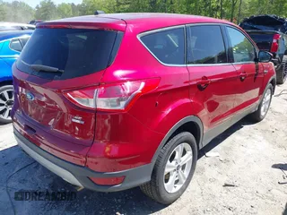 2016 Ford Escape SE with VIN 1FMCU9GX9GUC71209, listed as a IAAI auction lot 42037642 with 82,521 mi miles and . Bid and sale history available at DreamBid. Image 4.