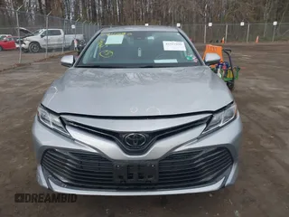 2019 Toyota Camry LE z VIN 4T1B11HK9KU851075, wystawiony jako IAAI lot #41911090 z przebiegiem 114 762 mil mil oraz . Historia ofert i sprzedaży dostępna na DreamBid. Obrazek 12.